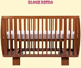 Нажмите для увеличения Использование кроватки Bloom Retro в цвете Oak с рождения, матрас установлен на верхнем уровне. Верхний уровень для удобства доступа к ребенку с рождения