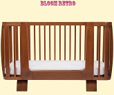 Нажмите для увеличения Вид кроватки с использованием Bloom Retro Bed Rail для преобразования кроватки Bloom Retro в цвете Oak в кушетку. Увеличивая срок использования кровати уже как кушетки для ребенка школьного возраста. Фото: передний плана
